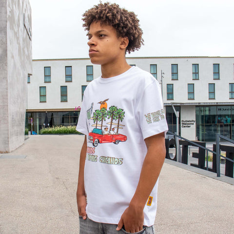 Allmosst  Americanos Graphic Custom T-shirt White. On model side view and a big House on a background