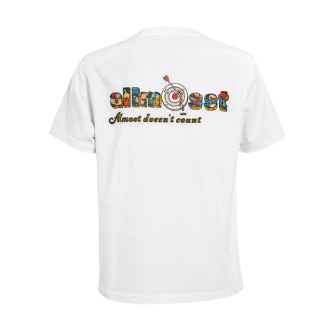 A short-sleeved white Undefeated Champ T-shirt