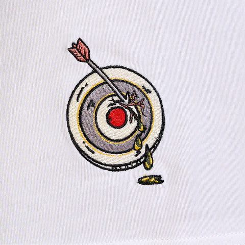 A short-sleeved white Undefeated Champ T-shirt